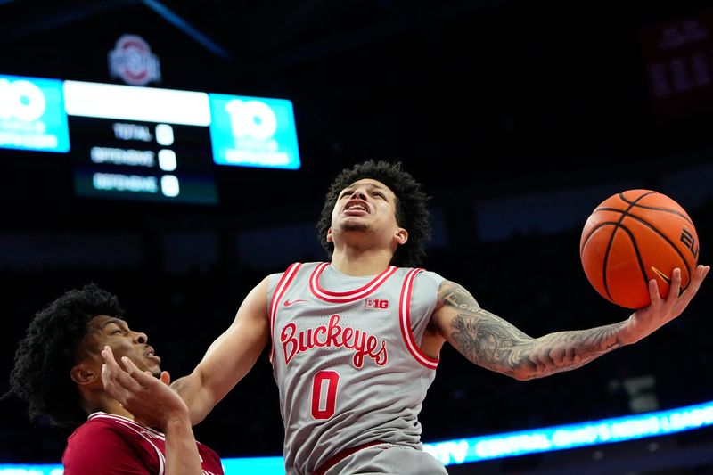 Ohio State Buckeyes guard John Mobley Jr. (0) shoots the ball against the Indiana Hoosiers in the first half of the NCAA game at Value City Arena on Saturday, March 7, 2026 in Columbus, Ohio.