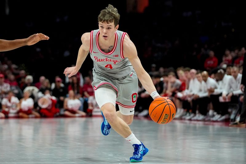 Ohio State Buckeyes guard Gabe Cupps (4) dribbles the ball in the first half of the NCAA game at Value City Arena on Saturday, March 7, 2026 in Columbus, Ohio.