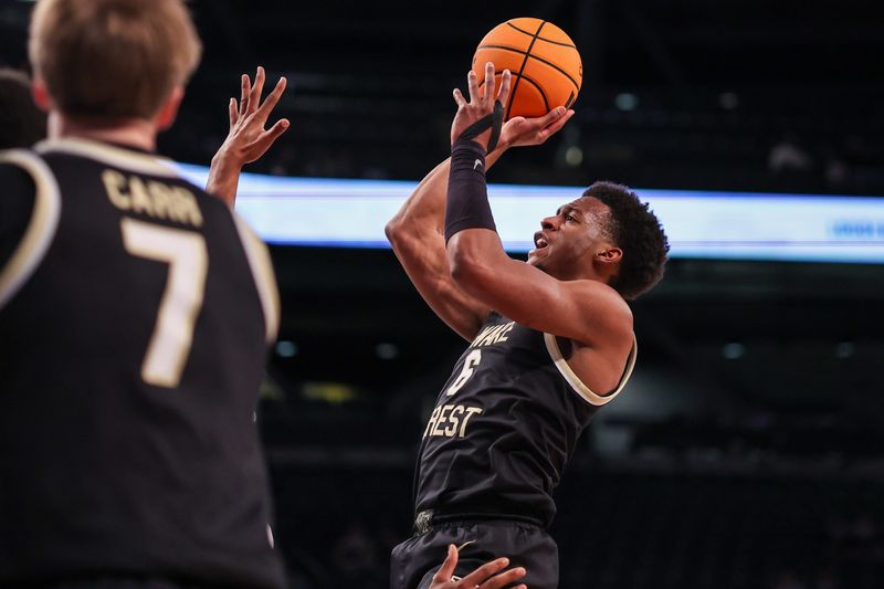 Wake Forest Demon Deacons guard Myles Colvin (6) shoots against the Georgia Tech Yellow Jackets. Colvin committed to the Cincinnati Bearcats April 10 and was signed April 23.