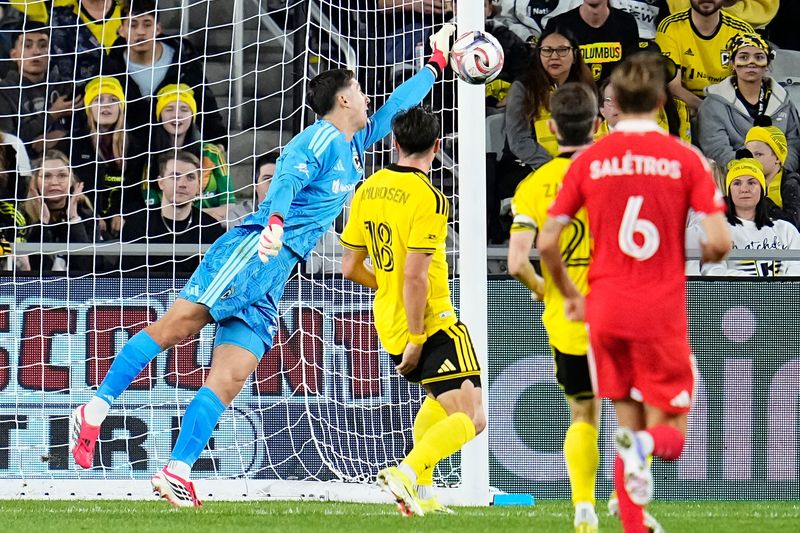 Crew goalkeeper Patrick Schulte makes a save in a 0-0 draw with the Chicago Fire.