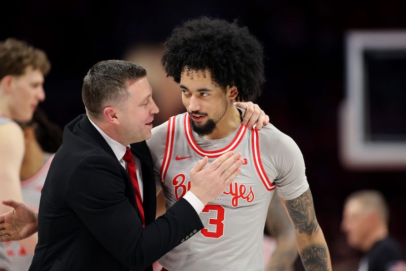 Mar 7, 2026; Columbus, Ohio, USA; Ohio State Buckeyes guard Taison Chatman (3) celebrates with head coach Jake Diebler during the first half against the Indiana Hoosiers at Value City Arena. Mandatory Credit: Joseph Maiorana-Imagn Images