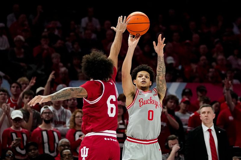 Ohio State Buckeyes guard John Mobley Jr. (0) shoots the ball against Indiana Hoosiers guard Tayton Conerway (6) in the second half of the NCAA game at Value City Arena on Saturday, March 7, 2026 in Columbus, Ohio.
