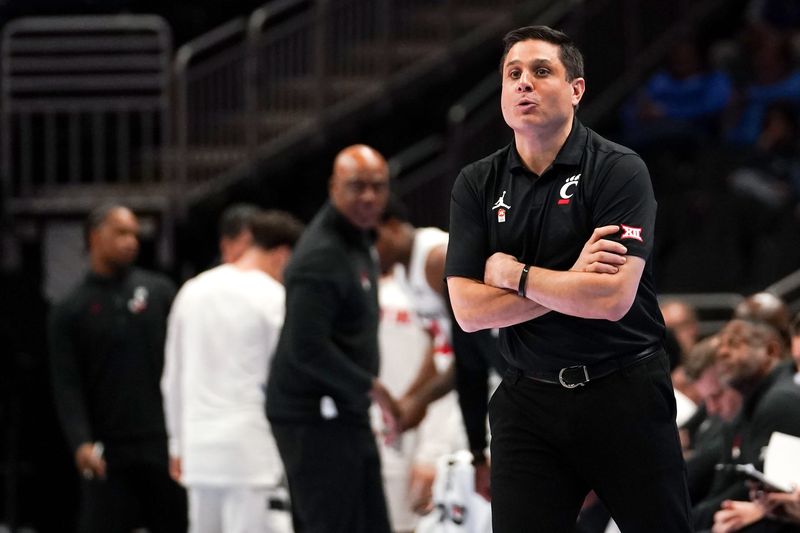 Cincinnati Bearcats head coach Wes Miller won his last game vs. Utah March 10 in the Phillips 66 Big 12 Tournament. UC lost to UCF 66-65 in OT March 11 and word of Miller's demise came about March 13.