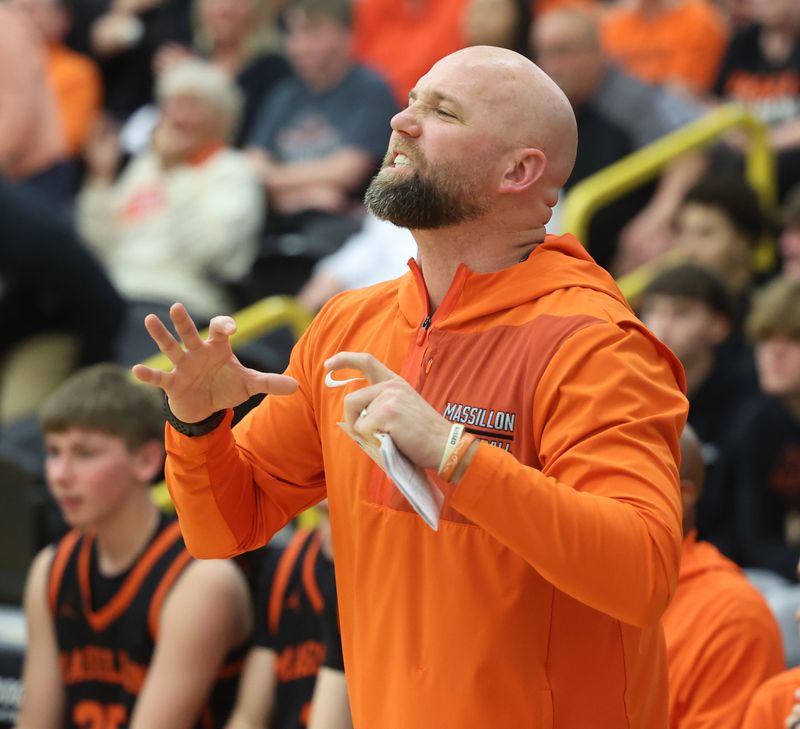 Massillon boys basketball coach Josh Hose signals to his team as it takes on Avon in an OHSAA Division II boys basketball regional semifinal at the College of Wooster, Wednesday, March 11, 2026.