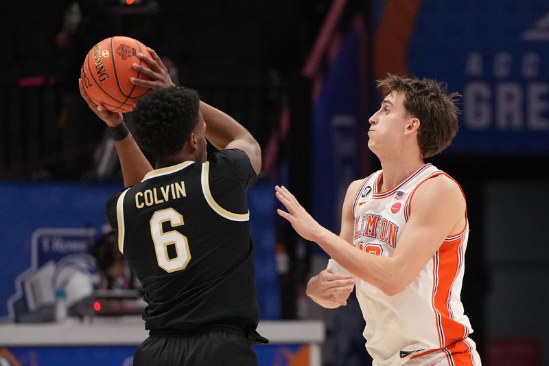 Myles Colvin(6) plays in the ACC Tournament against Clemson March 11. Colvin has committed to the Cincinnati Bearcats.