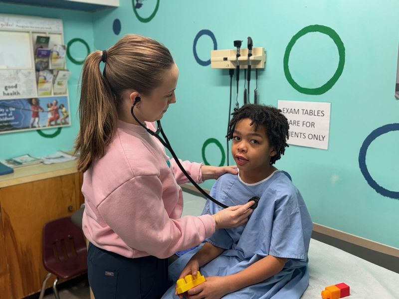 Grace Fruth, a nurse practitioner at the Margaret B. Shipley Child Health Clinic in Canton, checks Ja'Siyah Weir. The clinic, which serves children in 12 counties, celebrates its 55th anniversary this year.