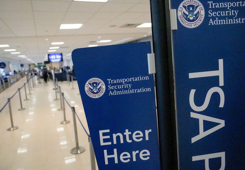 Transportation Security Administration (TSA) workers check over carry-on items at Greenville-Spartanburg International Airport in Greer, SC Friday, March 13, 2026. The workers are doing their job without getting paid until after the partial Federal Governenment Shutdown is resolved.