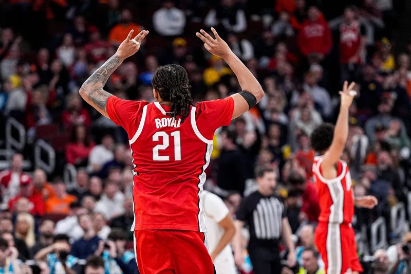 Ohio State forward Devin Royal (21) celebrates a 3-pointer against Michigan during the second half of Big Ten tournament quarterfinal at United Center in Chicago on Friday, March 13, 2026.