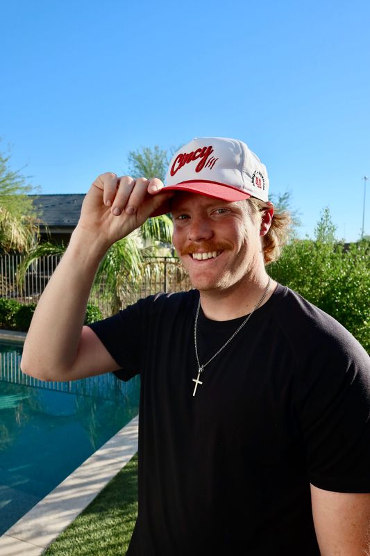 Reds' Opening Day starting pitcher Andrew Abbott with his all-new Cincy Hat collaboration.