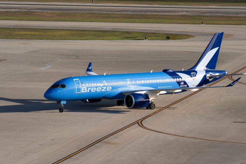 A Breeze Airways jet taxis to the gate at Palm Beach International Airport on March 11, 2026, in West Palm Beach, Florida.