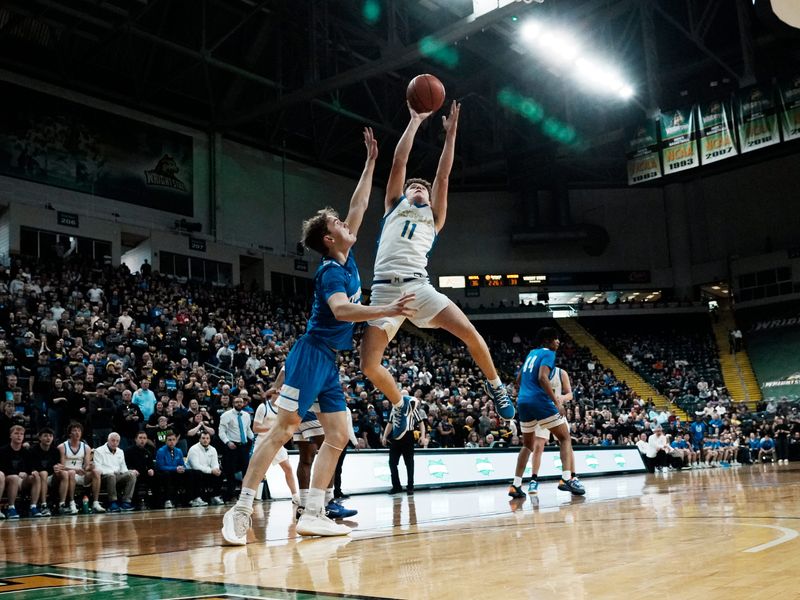 Senior guard Landon Iden goes up for a shot during Maysville's 68-51 loss to Cincinnati Wyoming on Thursday, March 19, 2026, at Wright State's Nutter Center. Maysville, which defeated Wyoming in the 2025 Final Four en route to a state title, finished 26-2, which included a 26-game winning streak.