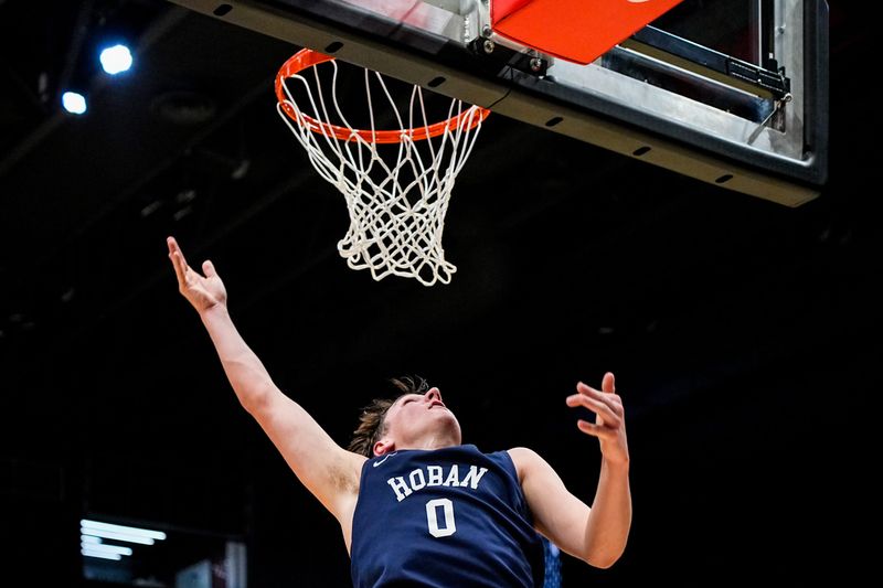 Hoban’s Nico Caporaletti (0) follows through on a layup during an OHSAA DIII boys basketball state semifinal game against Steubenville High School, March 19, 2026, at University of Dayton Arena in Dayton, Ohio.