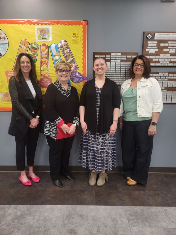 Pictured left to right are board member Maribeth Eckert, board president Brenda Uselton, Executive Director Killian Murray, and board member Erin Kick.