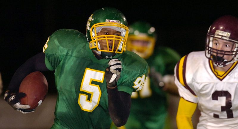 Newark Catholic's Mark Nichols runs away from a Berne Union defender during the Green Wave's run to the Division VI state championship in 2007. Nichols' classmates now are supporting him in is his fight with amyotrophic lateral sclerosis (ALS).