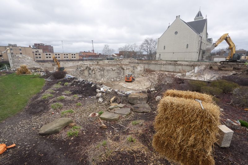 Eslich Wrecking crews remove debris from the underground portions of the former Stark Library in downtown Canton. The library system is building a new main campus.
