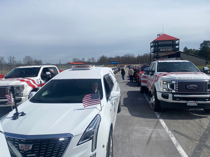 Greg Donnelly, 56, of Mansfield, took a final lap around Mid-Ohio Sports Car Course Wednesday, joined by 75 vehicles in his funeral procession.