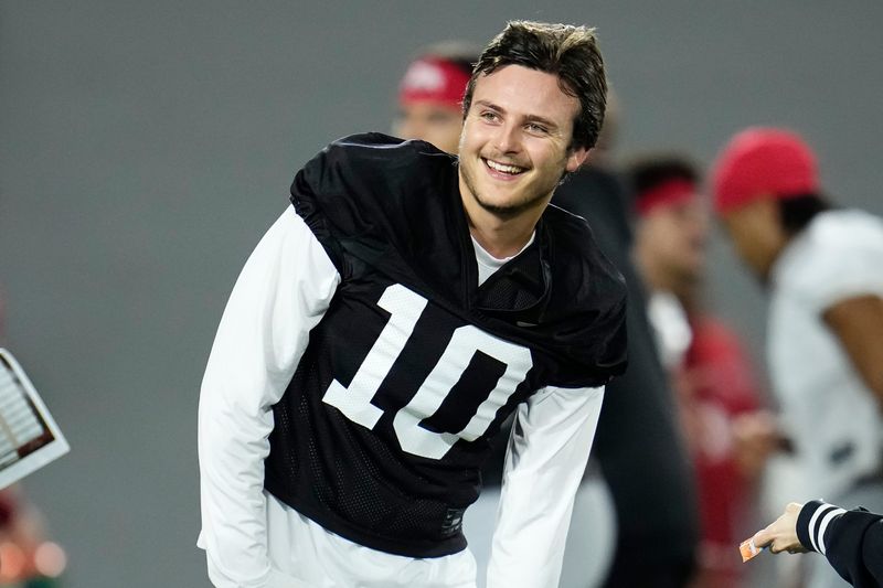 Ohio State Buckeyes quarterback Julian Sayin (10) laughs during the first day of spring workouts for the 2026 football season at Woody Hayes Athletic Complex in Columbus on March 10, 2026.
