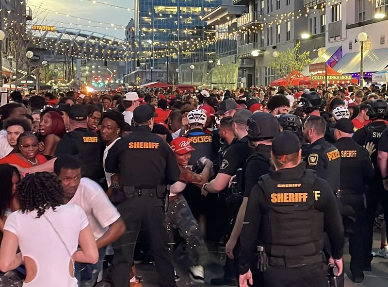 As Cincinnati police advanced upon a crowd deemed unruly at The Banks on March 26, 2026, several people fell over and dropped their belongings.