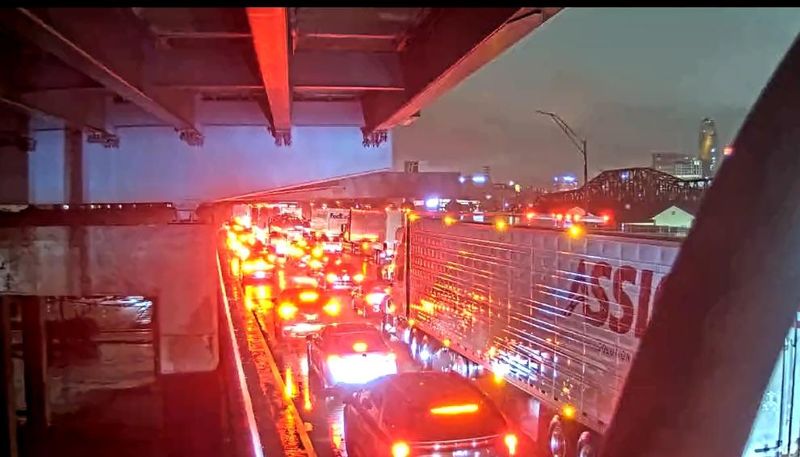 Traffic is backed up on the northbound lanes of the Brent Spence Bridge early Friday, March 27, 2026. All lanes of Interstate 75 North were shut down beyond the Ninth Street on-ramp due to a crash.