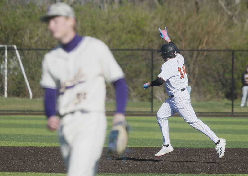 Loveland senior Drew Oerther reacts after hitting a home run as Loveland defeated Campbell County 7-3 in nine innings in the River Cup as part of the Skyline Chili Reds Futures Showcase March 28, 2026, at Sycamore High School.