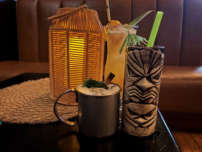 Clockwise from back: Summer's Passion, Pier Pressure Colada and Toucan Slam cocktails at Budd Dairy Food Hall