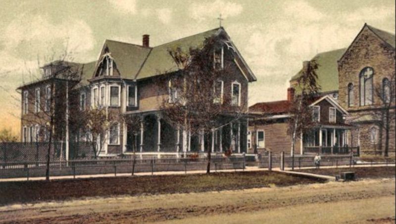 A 1909 Akron postcard shows the original Sacred Heart Academy at South Broadway and State Street near St. Bernard’s Catholic Church.