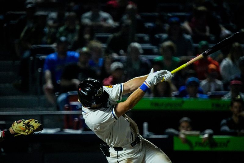 Akron outfielder Jake Fox (1) drives in Akron outfielder Nick Mitchell (8) during the home opening day game against Reading, April 2, 2026, in Akron, Ohio.