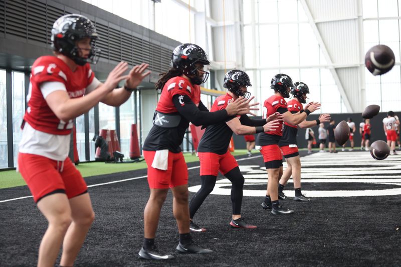 Cincinnati Bearcats quarterbacks workout at the Sheakley Indoor Performance Facility during 2026 spring practice.