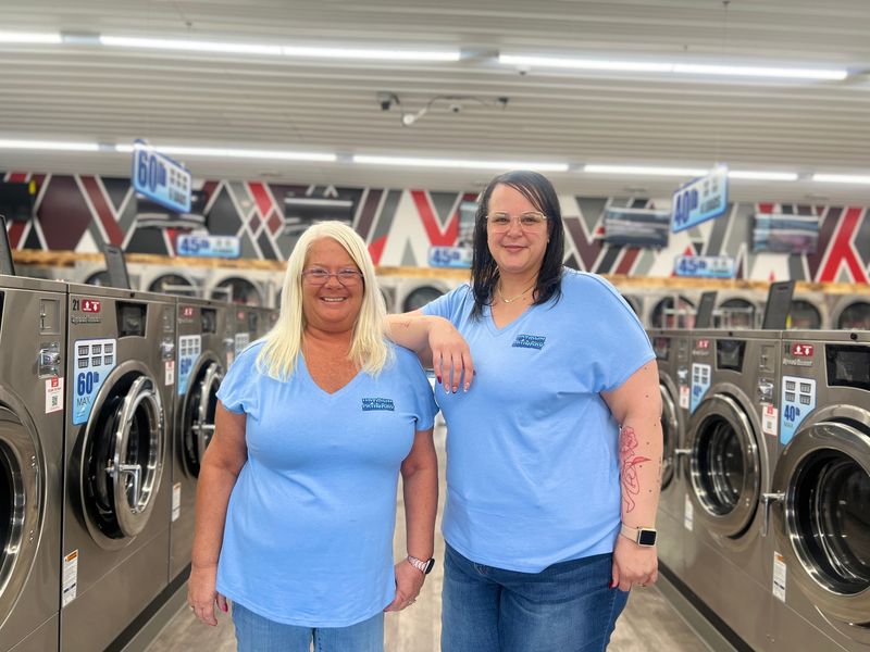 Owner Annisa Zorns (left) and manager Trish Triplett pose for a photo at the new laundromat owned by Zorns and her husband Bob. Uptown Laundry is located at 212 N. Walnut St. in Bucyrus.