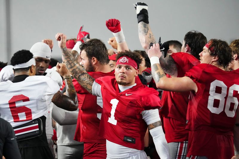 Ohio State Buckeyes wide receiver Brandon Inniss (1) huddles with teammates during Student Appreciation Day spring practice at the Woody Hayes Athletic Center on April 4, 2026.