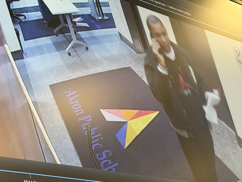 A security video at Akron Public Schools recorded Darian Johnson walking inside the district's administration building on Nov. 4. Johnson is accused of taking a document from his supervisor's desk on Nov. 4.
