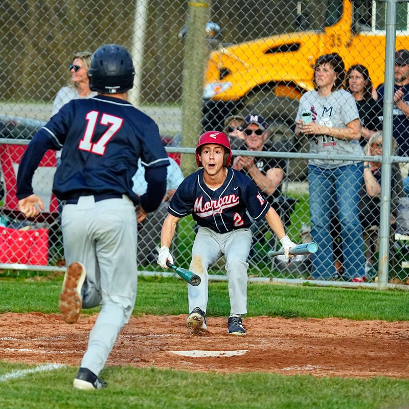 Morgan's Lucas Hager waits at home plate as McGwire Winner comes in to score during Morgan's 6-5 win against host Crooksville on April 2, 2026, in McLuney, Ohio.