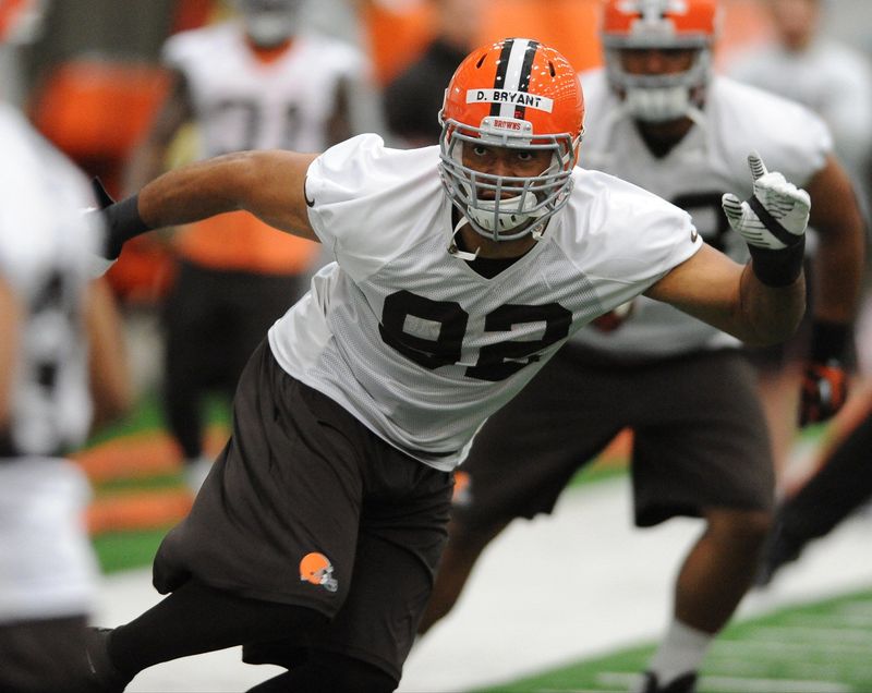 BEREA, OHIO - APRIL 30, 2014: Linebacker Desmond Bryant #92 of the Cleveland Browns goes through pre-practice stretches during a voluntary mini-camp practice at the Cleveland Browns Headquarters. (Photo by David Dermer/Akron Beacon Journal)