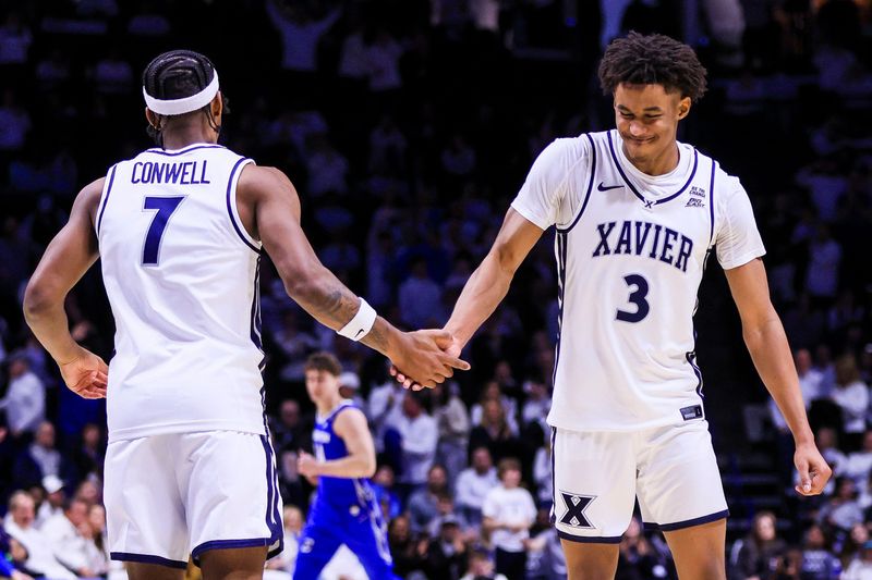 Ryan Conwell (7) and Dailyn Swain (3), teammates for one season at Xavier, were both picked in the 2026 NBA Draft.