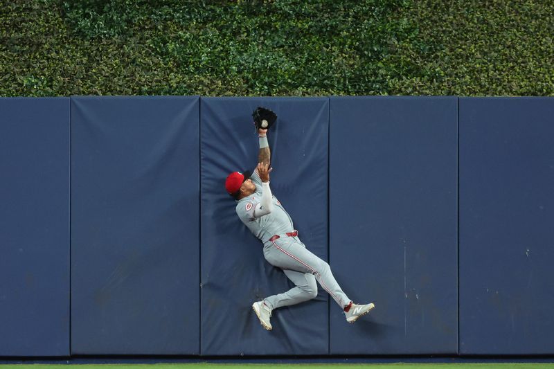 Cincinnati Reds center fielder Dane Myers makes a highlight-reel catch in the first inning against the Miami Marlins on Thursday April 9.