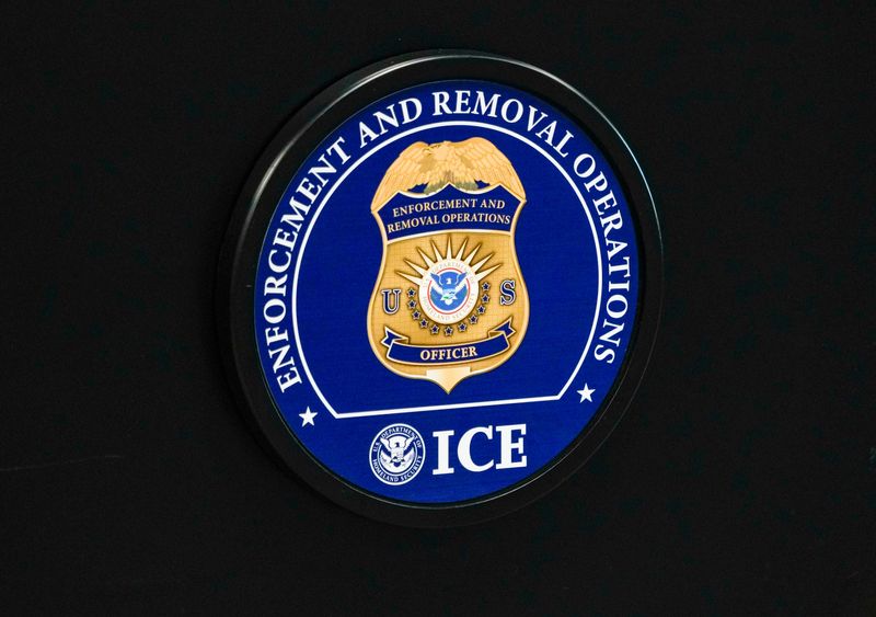 An ICE Enforcement and Removal Operations seal is seen on the podium during a news conference about an undocumented Haitian immigrant who police believe murdered a convenience store clerk in Fort Myers, Fla.,. The conference was held at U.S. Immigration and Customs Enforcement Fort Myers on Friday, April 10, 2026.