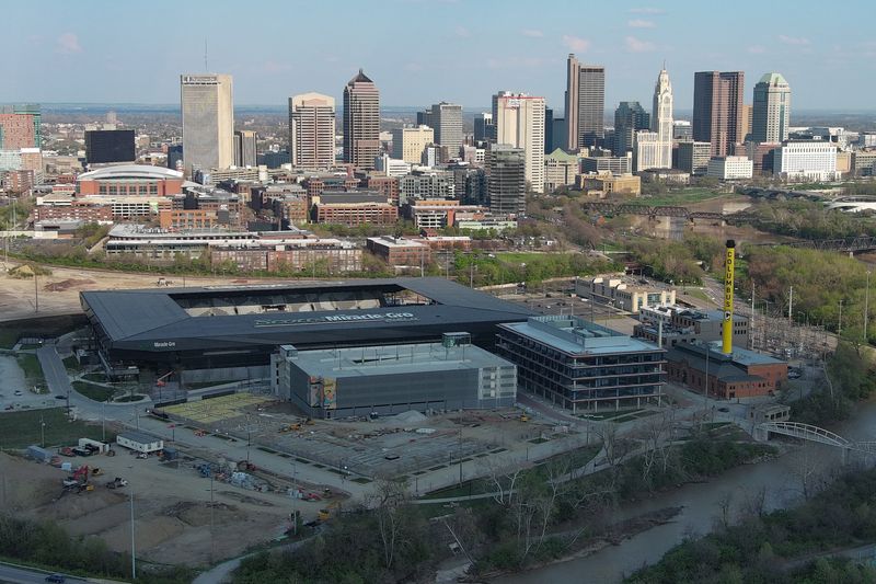 ScottsMiracle‑Gro Field, home of the Columbus Crew, is seen with the Columbus skyline in the background. Around the stadium is Astor Park, a housing, office and parking garage development. The stadium has a seating capacity of 20,371.