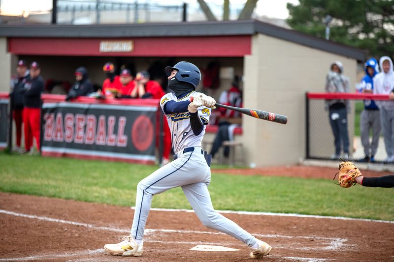 Woodmore's Keil Almroth makes contact.