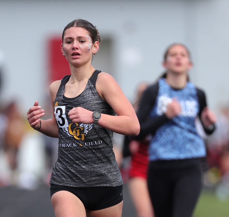 Garfield’s Lina Kaufman nears the finish in the girls 1,600 meter run during the Don Faix Invitational track meet at Crestwood High School, April 11, 2026, in Mantua, Ohio.