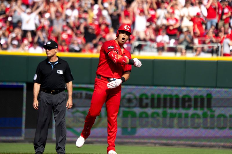 First baseman Nathaniel Lowe reacts after hitting a bases-clearing three-run double in the first inning of the Reds' eventual 7-3 victory that ended their three-game losing streak.