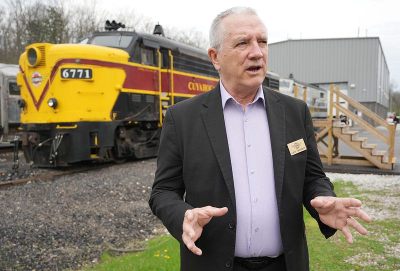 Larry Stevenson, president and CEO, Cuyahoga Valley Scenic Railroad, stands near one of the two historic locomotives that will be converted to an all-electric operation at the railroad’s Fitzwater Maintenance Facility in Independence on April, 14, 2026. The electrification of CVSR's two historic locomotives is made possible through $2.1 million in Ohio EPA grants.