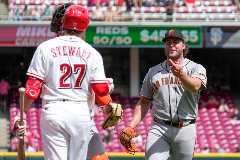 San Francisco pitcher Erik Miller approaches Sal Stewart after the final out of the Giants' 3-0 victory over the Reds in the series finale April 16. The incident followed players on each team being hit earlier in the game.