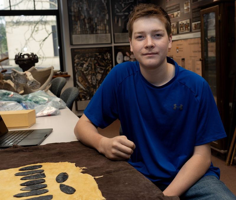 Joshua Fetter, 17, found a cache of 9 stone tools when he was 11 years-old, near Sugarcreek, Ohio. Kent State archaeologists research of five years, suggests the artifacts may date back nearly 2,000 years to prehistoric Adena culture. A published paper has been approved for the find, with Fetter named as one of the authors. Fetter and his family met with KSU archaeology professor Metin Eren in Kent on April 16, 2026.
