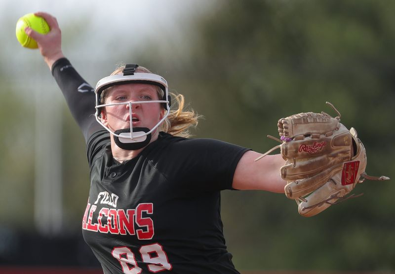 Field pitcher Adrianna Berry winds up for an Aurora batter during the second inning of a high school softball game at Field High School, April 17, 2026, in Mogadore, Ohio.