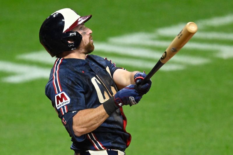 Apr 17, 2026; Cleveland, Ohio, USA; Cleveland Guardians shortstop Daniel Schneemann (10) hits a grand slam in the seventh inning against the Baltimore Orioles at Progressive Field. Mandatory Credit: David Richard-Imagn Images