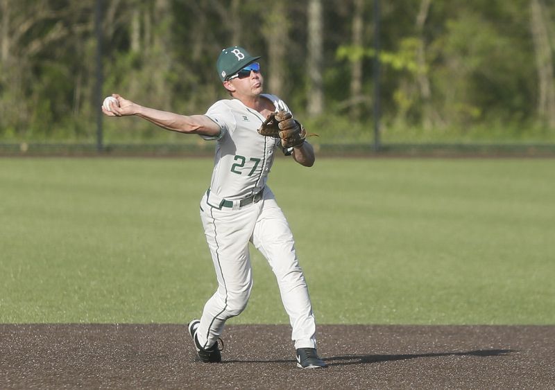 Batavia senior shortstop Brayden Schmittou throws to first as Indian Hill defeated Batavia 9-3 in OHSAA high school baseball April 17, 2026, at Batavia.