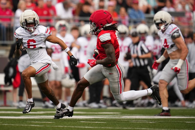 Wide receiver Jeremiah Smith (4) runs for a touchdown during the Ohio State football spring game at Ohio Stadium in Columbus on April 18, 2026.