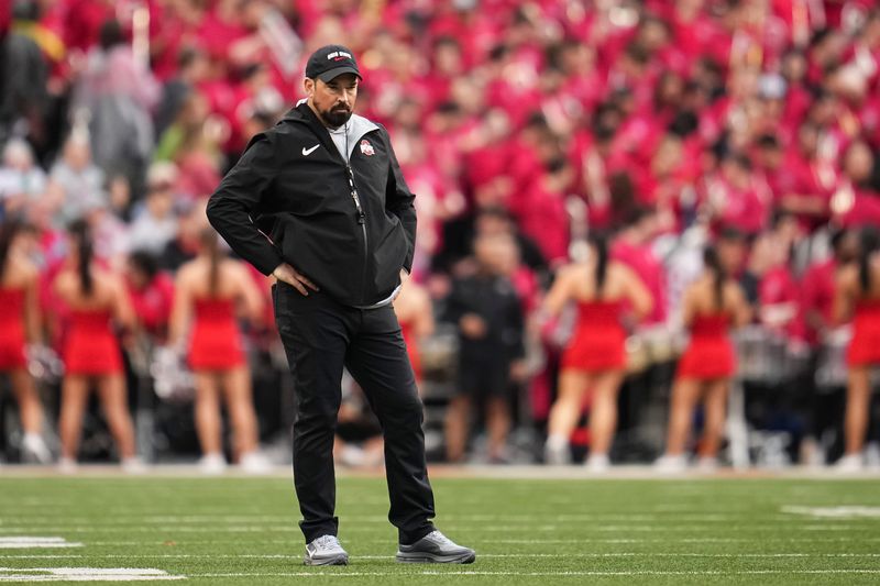 Ohio State Buckeyes head coach Ryan Day watches during the Ohio State football spring game at Ohio Stadium in Columbus on April 18, 2026.