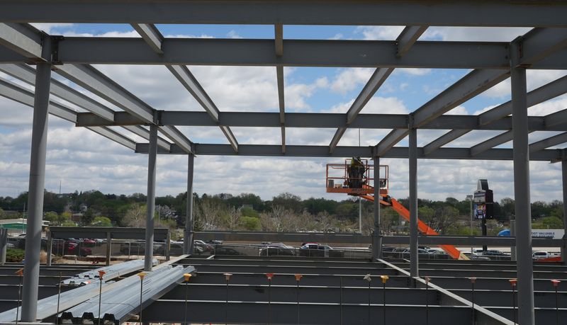 Beaver Constructors employees work on the KeyBank Center at the Pro Football Hall of Fame in Canton. The work is expected to be completed in the spring of 2027.