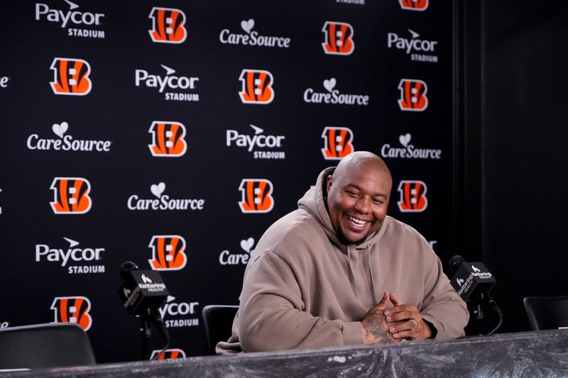 Newly signed Cincinnati Bengals defense tackle Dexter Lawrence speaks in a press conference for the first time since joining the team at Paycor Stadium in Cincinnati on Monday, April 20, 2026.